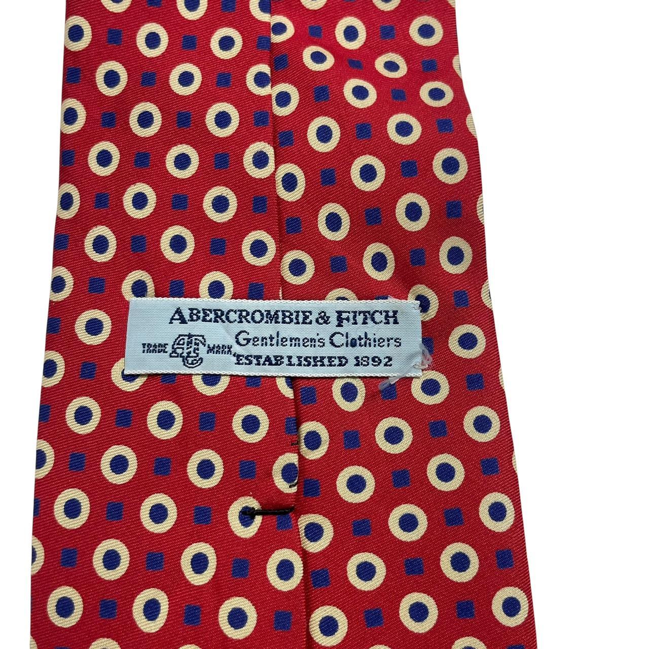 Abercrombie & Fitch vintage silk tie red and blue with classic pattern design.