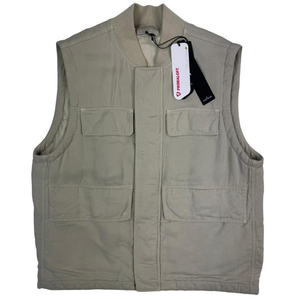 Stone Island beige vest jacket with logo patch and Primaloft material.