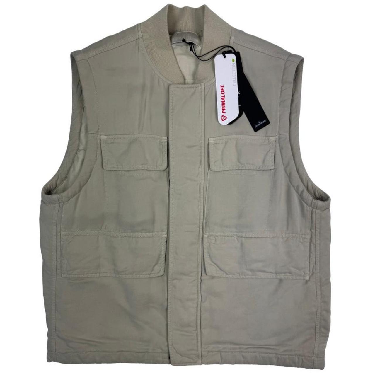 Stone Island beige vest jacket with logo patch and Primaloft material.