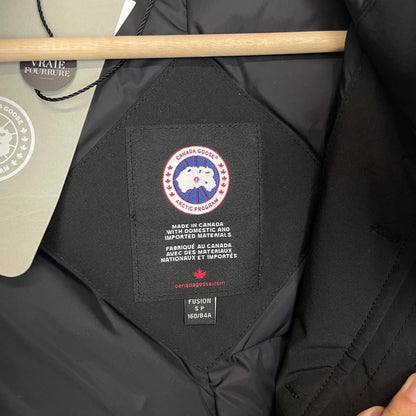 Canada Goose black parka coat with fur trim and logo patch, brand new with tags.