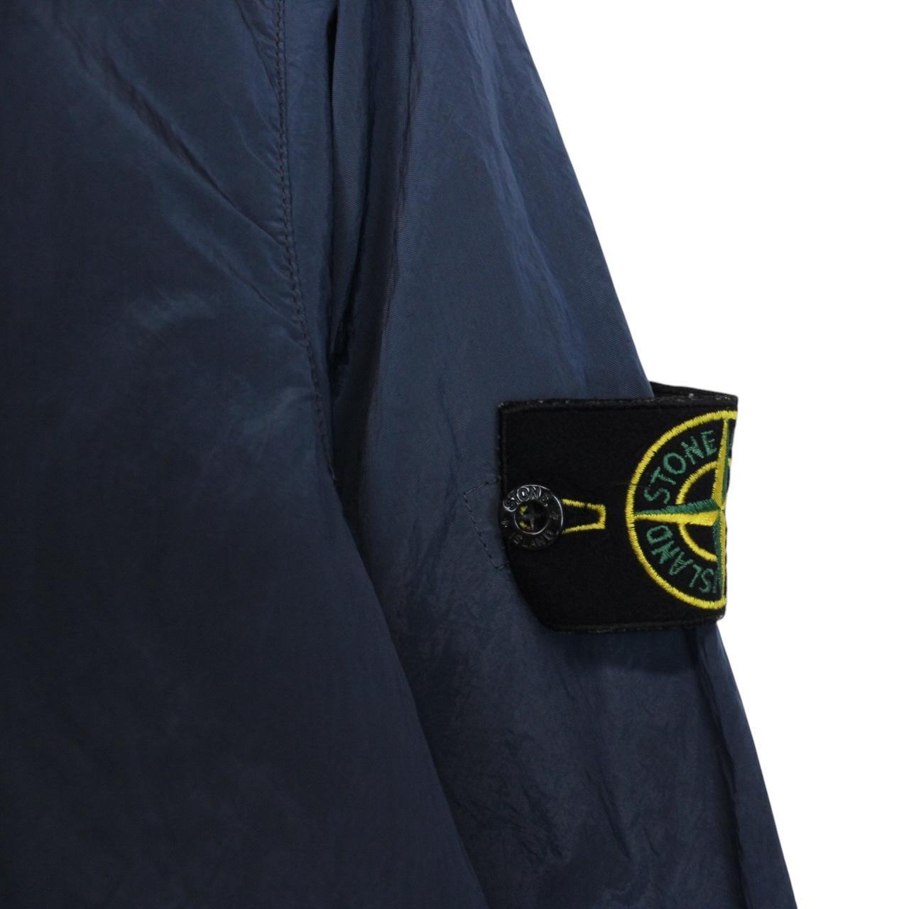 Stone Island navy blue full zip nylon overshirt with logo patch and metal finish.