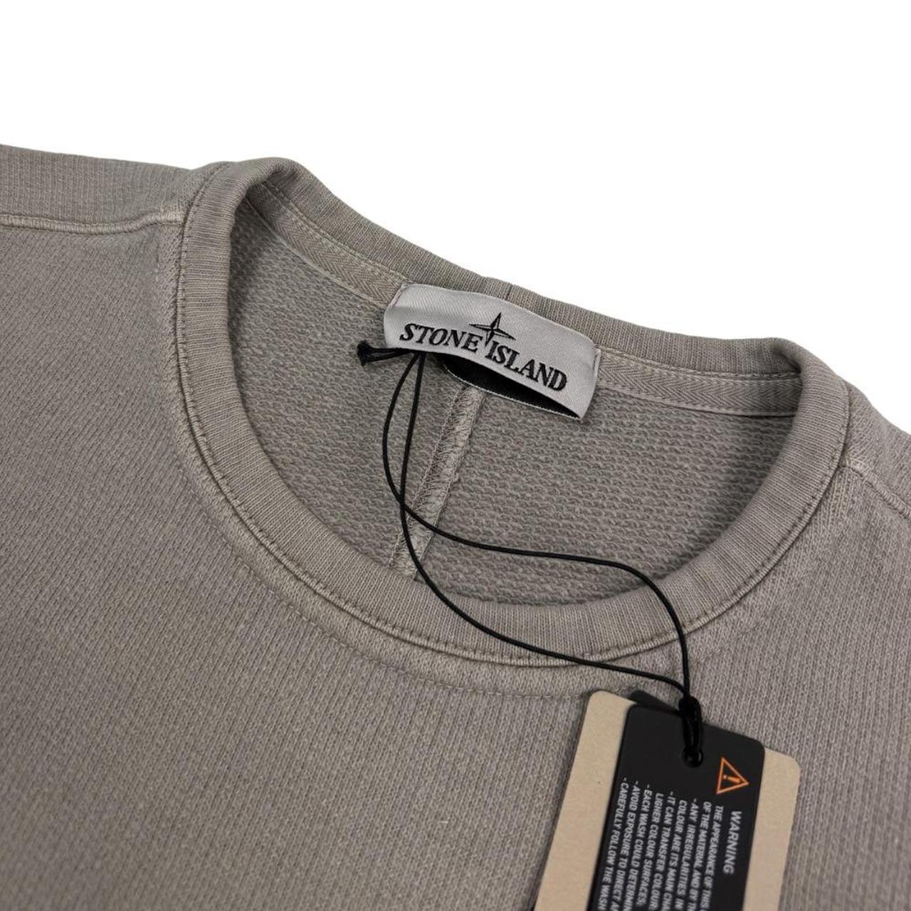 Stone Island khaki brown sweatshirt with logo patch and closed loop design.