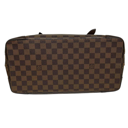 Louis Vuitton brown duffel bag with Damier Ebene pattern and logo plaque details.