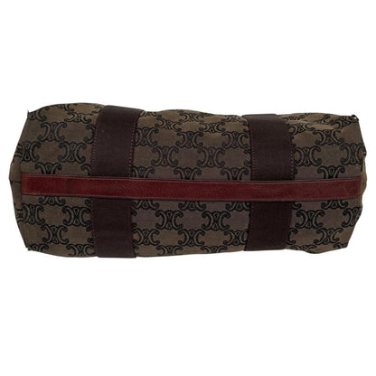 CELINE brown duffel bag with Macadam Triomphe pattern and canvas material.