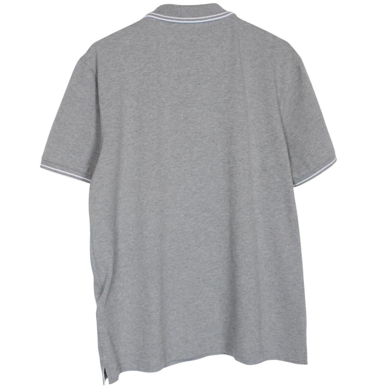Stone Island grey polo shirt with embroidered compass logo and cotton material.