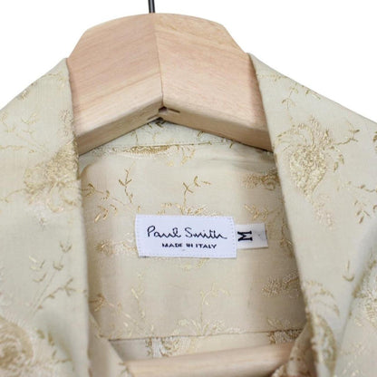 Paul Smith beige long sleeve silk shirt with subtle logo detail and smooth texture.