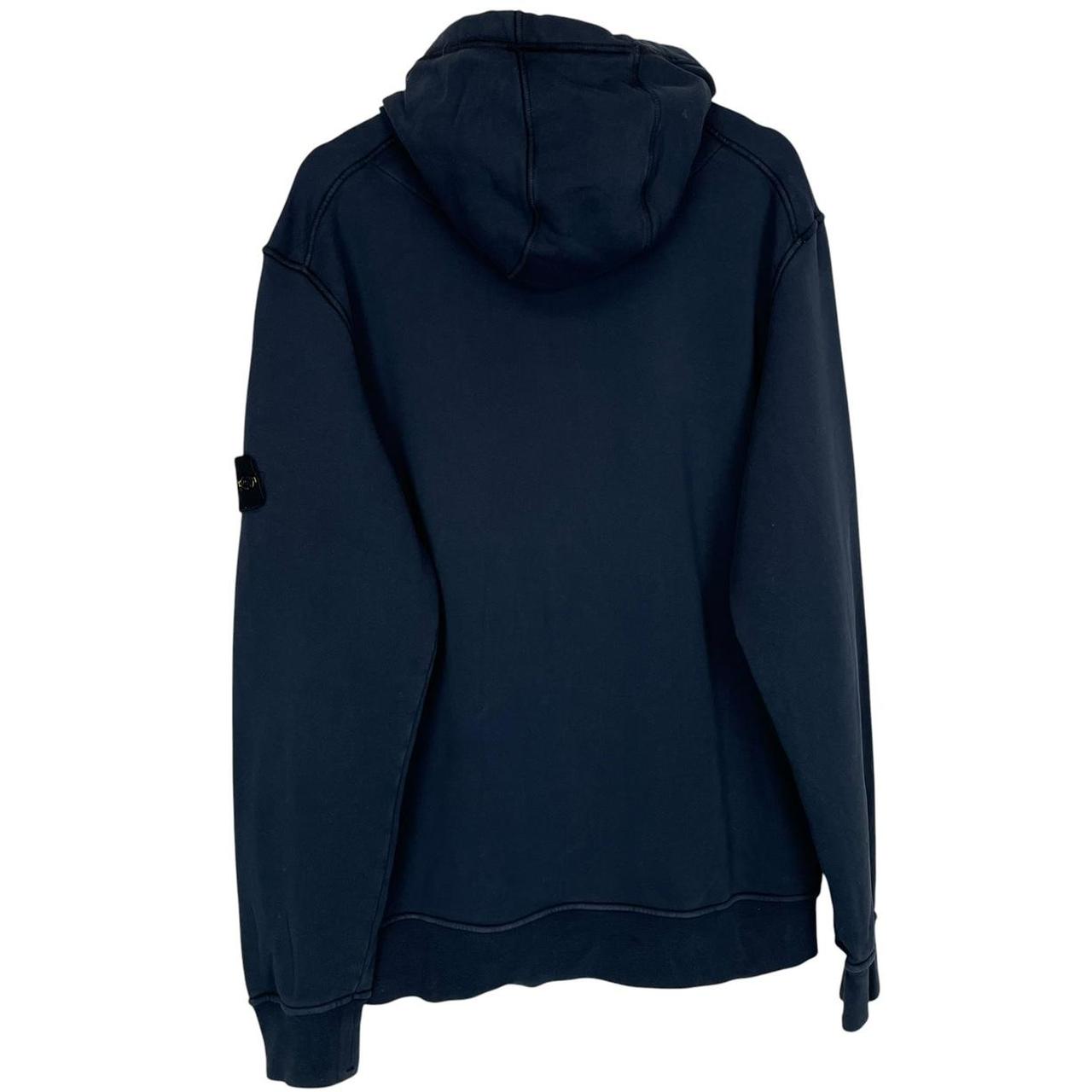 Stone Island navy blue cotton hoodie with iconic compass logo on sleeve.