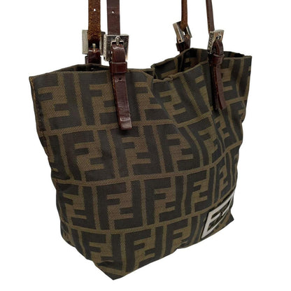 Fendi brown duffel bag featuring iconic Zucca monogram canvas and durable handles.
