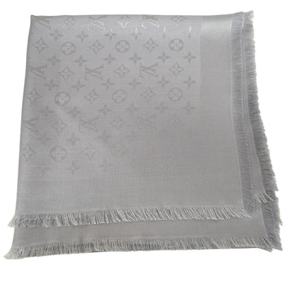 Louis Vuitton grey shawl scarf with LV monogram pattern in silk and wool blend.