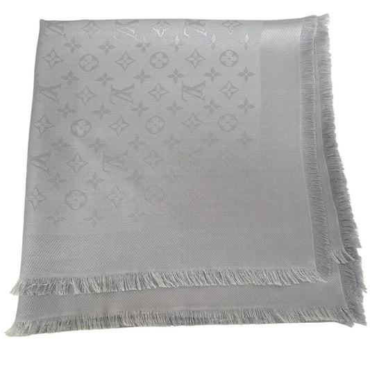 Louis Vuitton grey shawl scarf with LV monogram pattern in silk and wool blend.