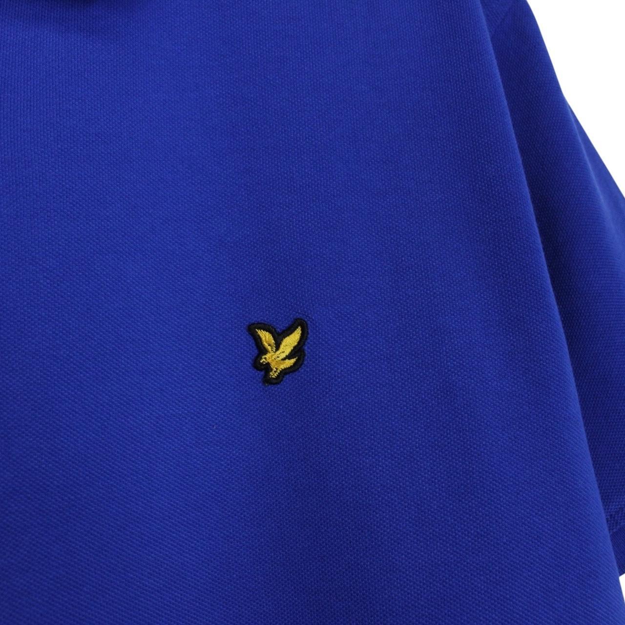Lyle & Scott blue short sleeve polo shirt with embroidered logo and cotton material.