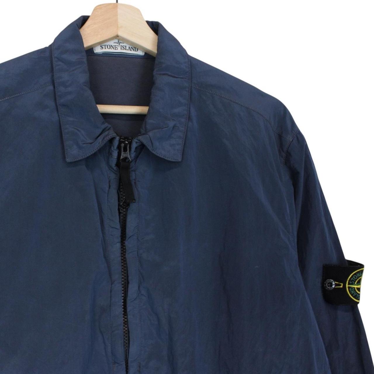 Stone Island navy blue full zip nylon overshirt with logo patch and metal finish.
