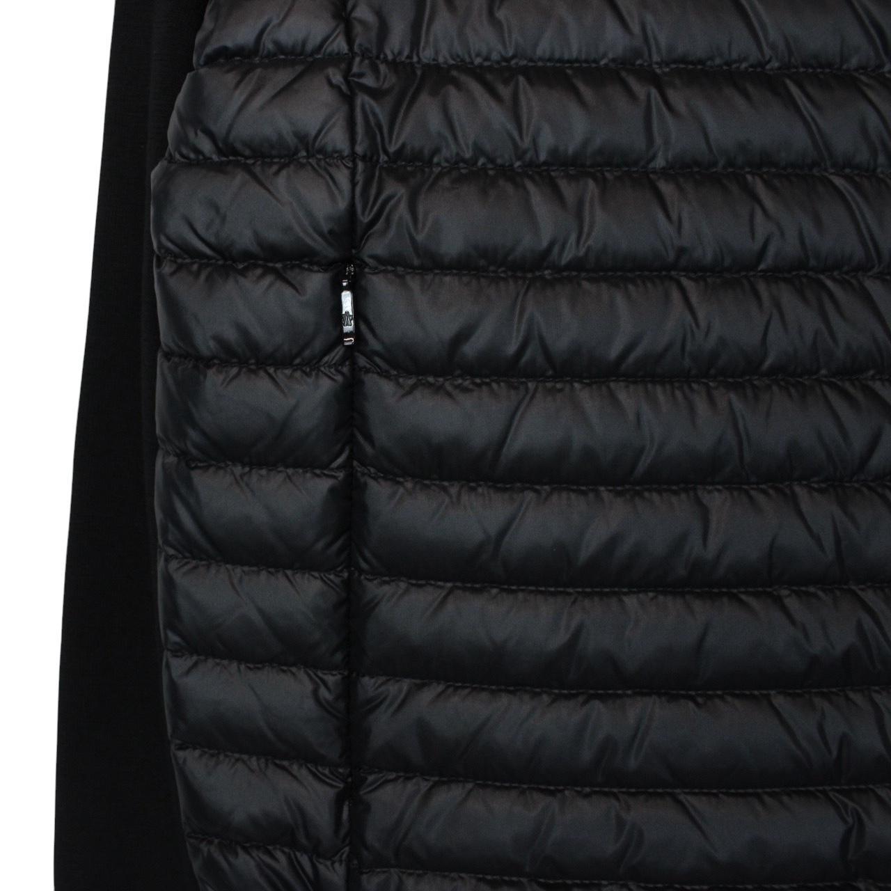 Moncler black cardigan jacket with full zip, down tricot material, and logo detail.
