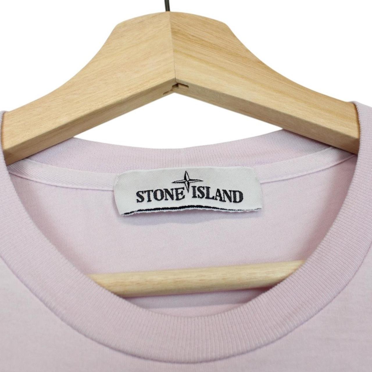 Stone Island pink long sleeve t-shirt with compass logo and pocket detail.