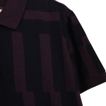 Paul Smith burgundy polo shirt with short sleeves, cotton material, brand logo on collar.