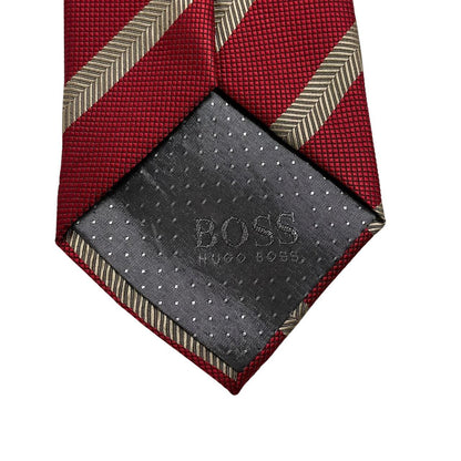 Hugo Boss red striped silk tie with subtle sheen and classic design.