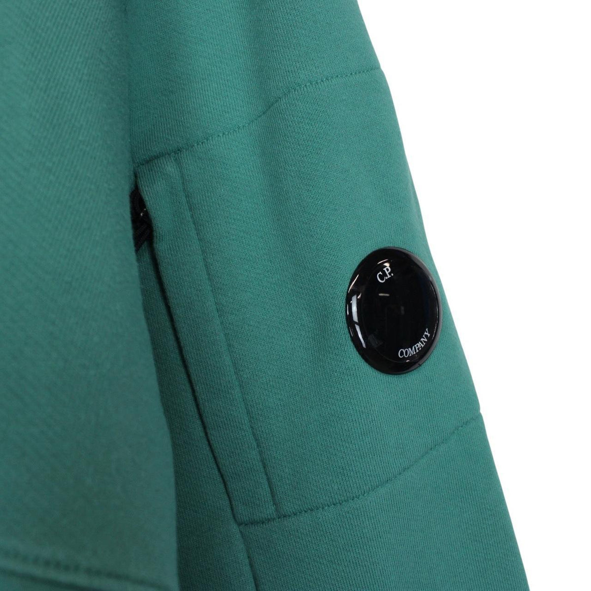 CP Company green hoodie jumper with lens detail and cotton material.