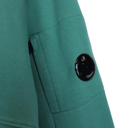 CP Company green hoodie jumper with lens detail and cotton material.