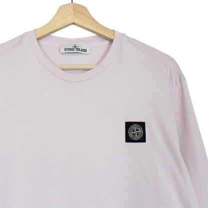 Stone Island pink long sleeve t-shirt with compass logo and pocket detail.