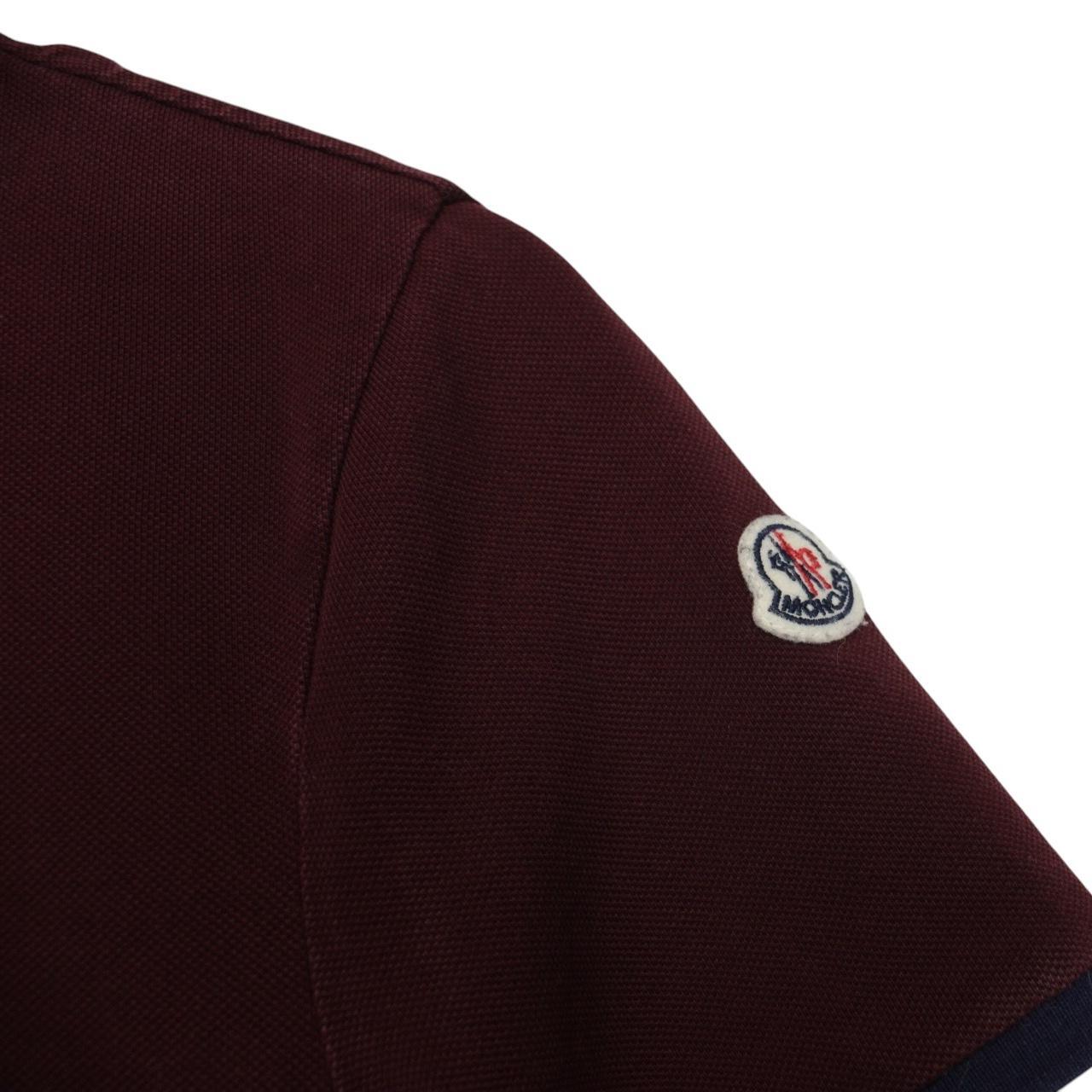 Moncler burgundy short sleeve polo shirt with logo detail and cotton material.
