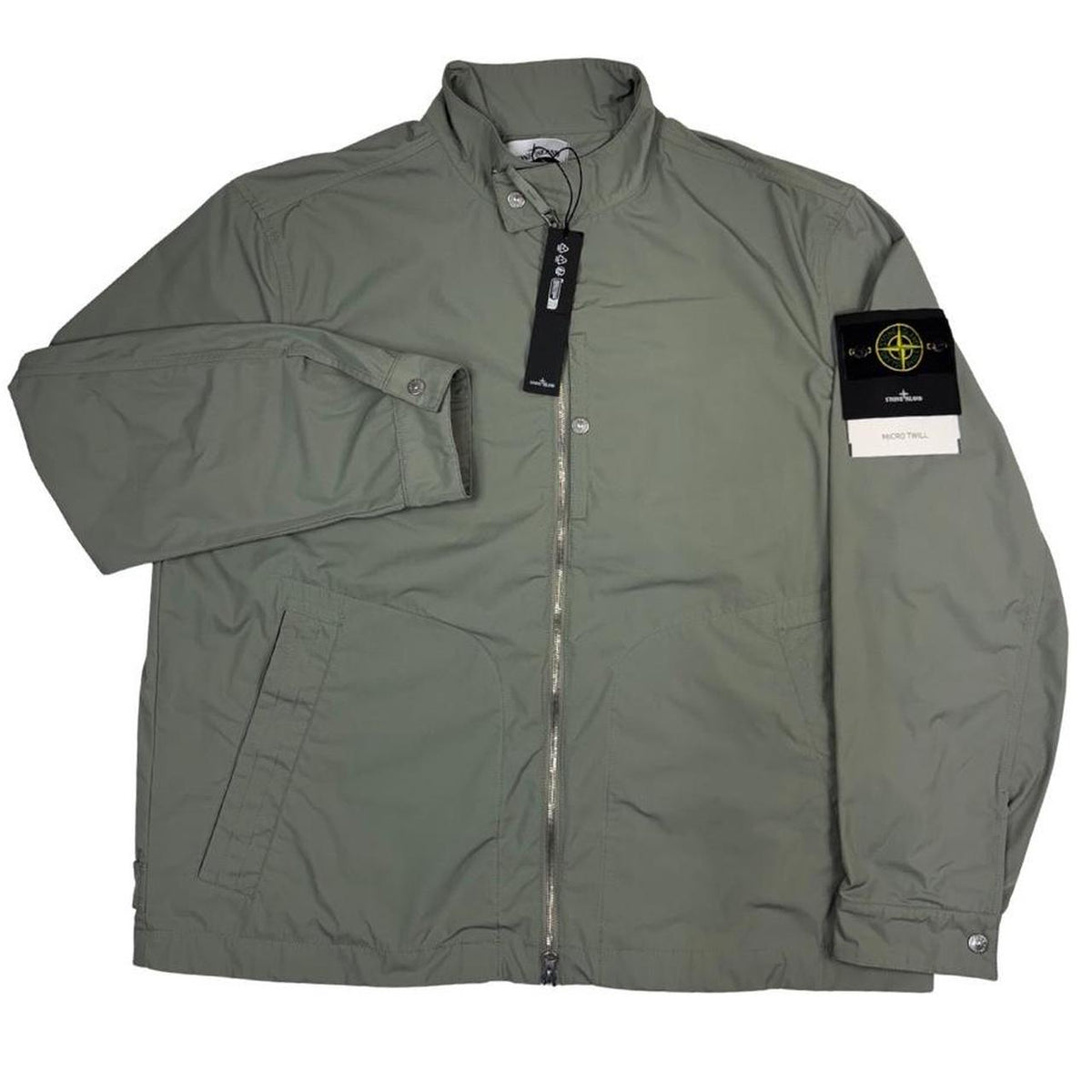 Stone Island green full zip jacket with logo patch and micro twill fabric.