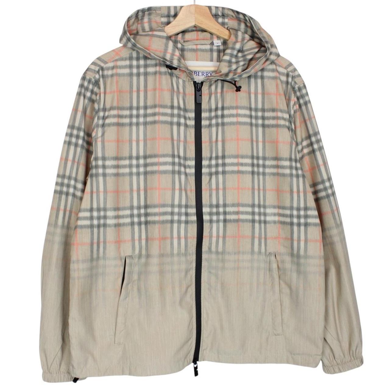 Burberry beige windbreaker jacket with Nova Check pattern and full zip hood.