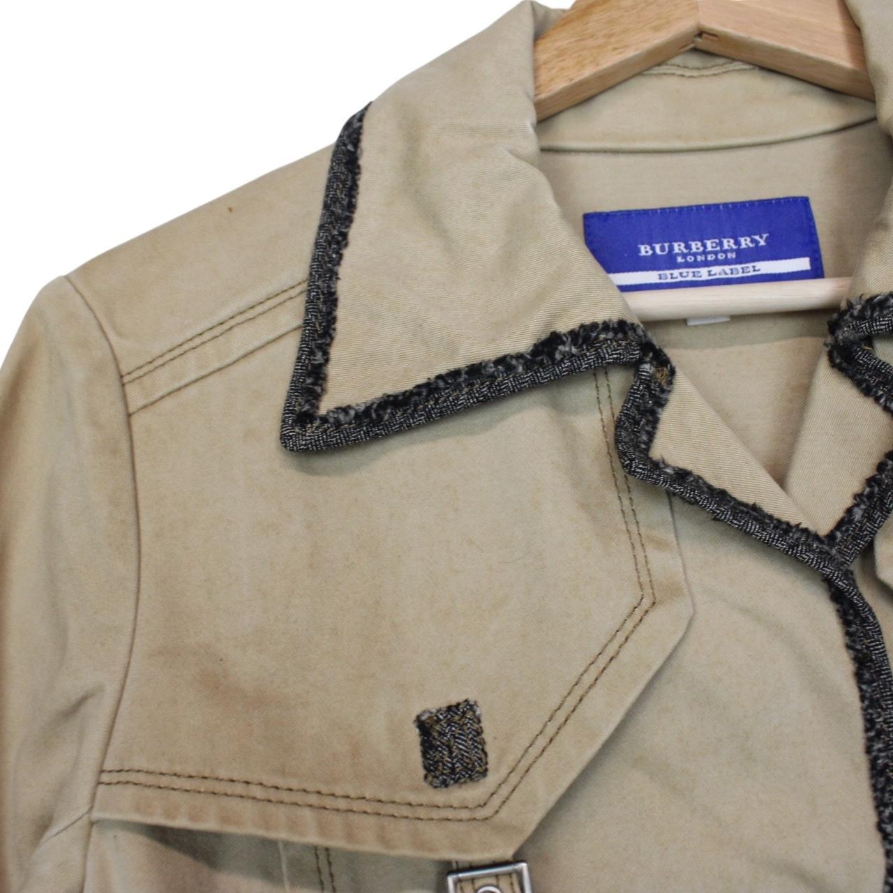 Burberry tan brown denim jacket with logo patch and visible stains, vintage style.