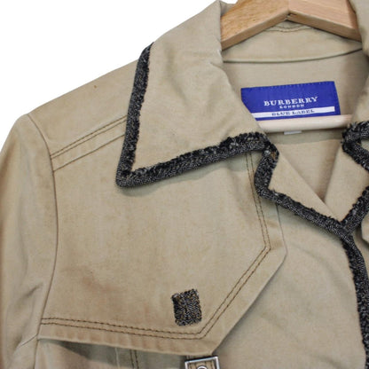 Burberry tan brown denim jacket with logo patch and visible stains, vintage style.