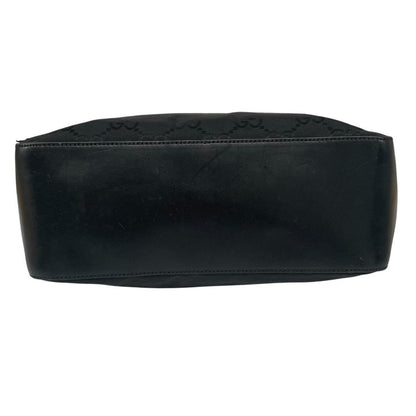 Gucci black hobo shoulder bag with monogram canvas and leather detailing.