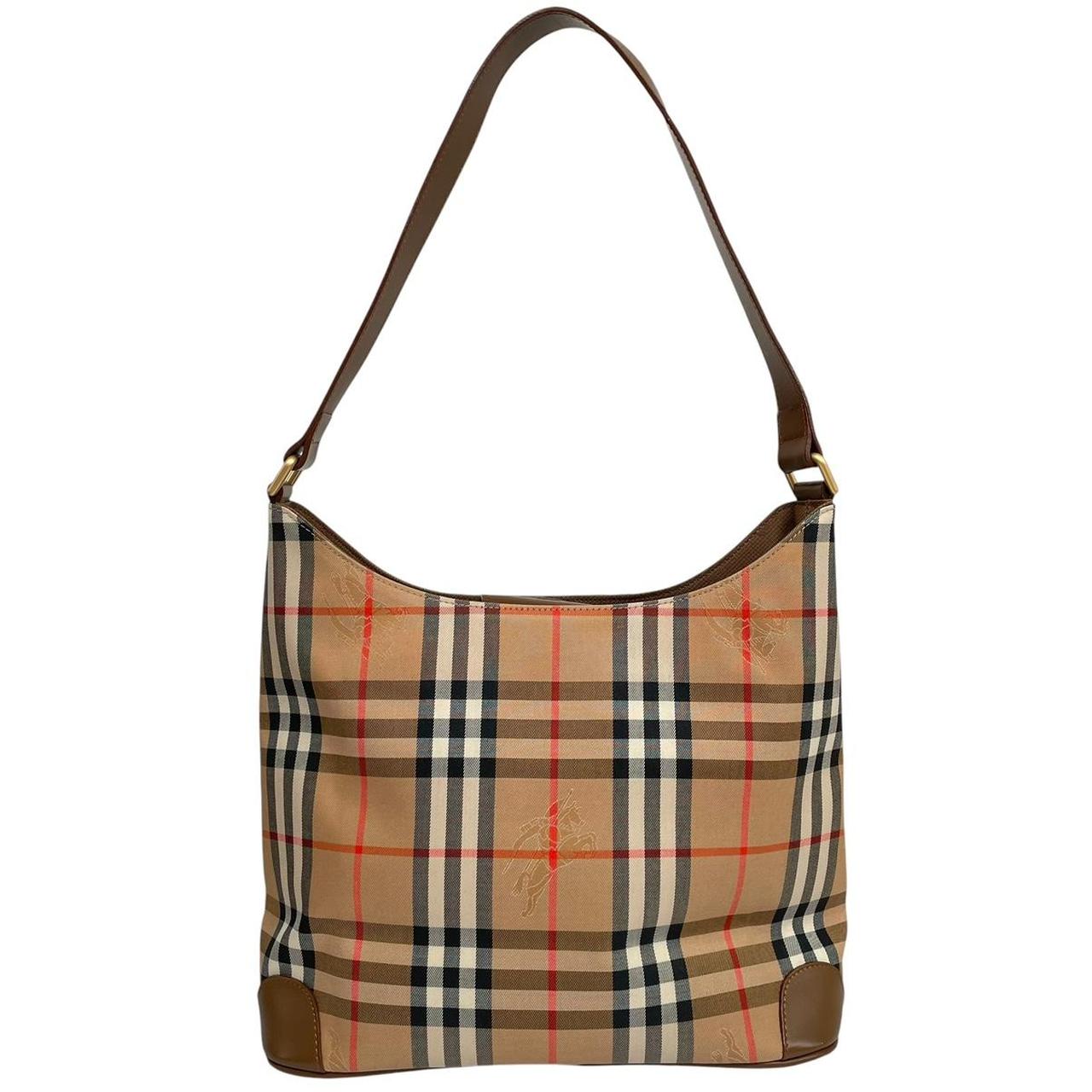 Burberry tan brown duffel bag featuring iconic Nova Check pattern and leather accents.