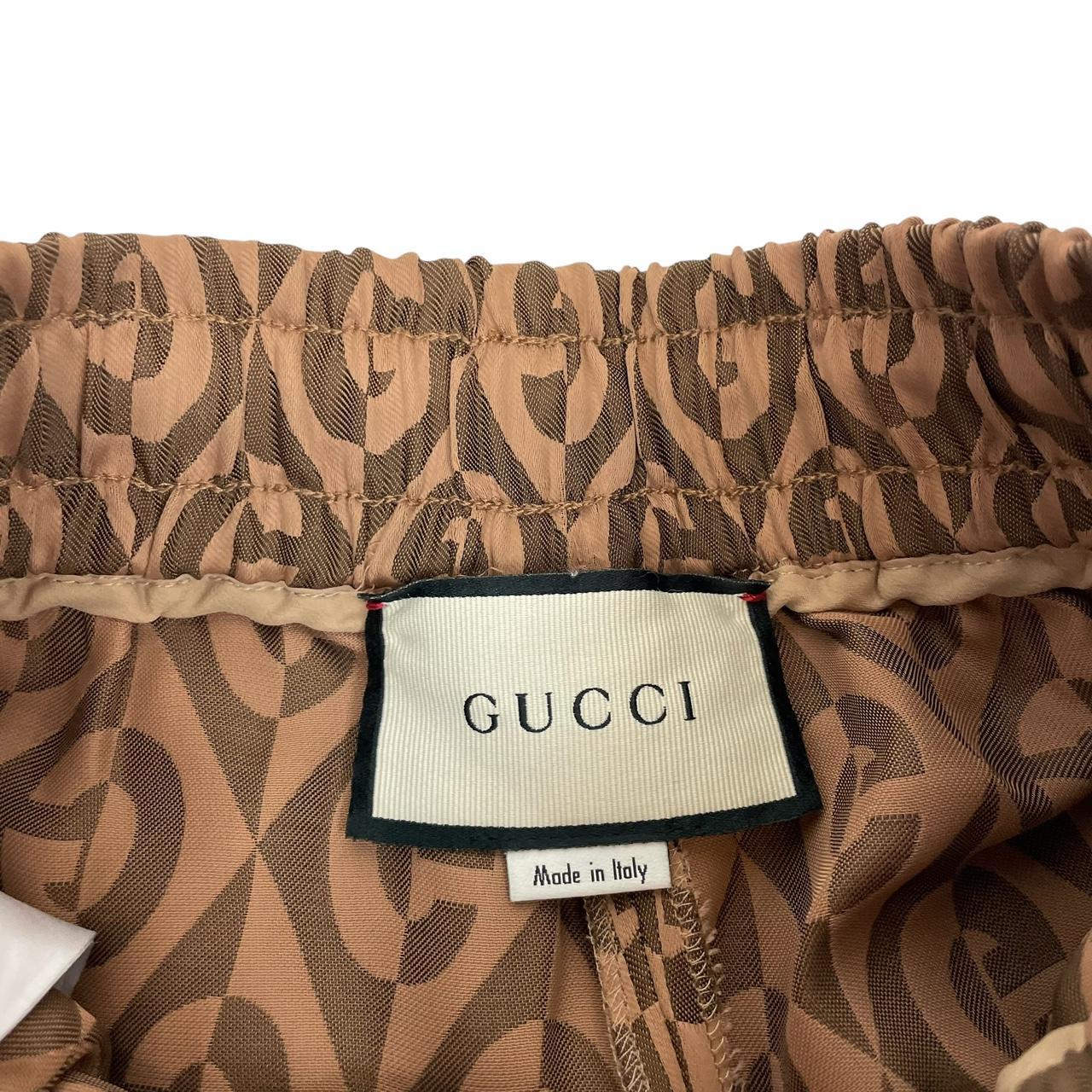 Gucci brown trousers with G rhombus jacquard pattern and soft viscose material.