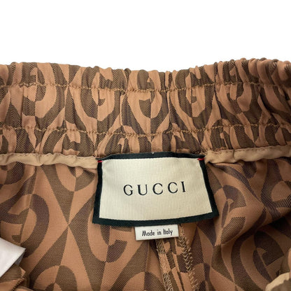 Gucci brown trousers with G rhombus jacquard pattern and soft viscose material.