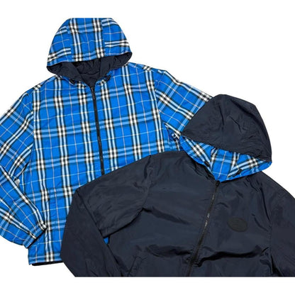 Burberry reversible windbreaker jacket in blue and black with Nova Check pattern.