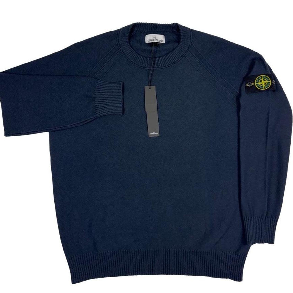 Stone Island navy blue knit jumper with micro stitch detailing and logo patch.