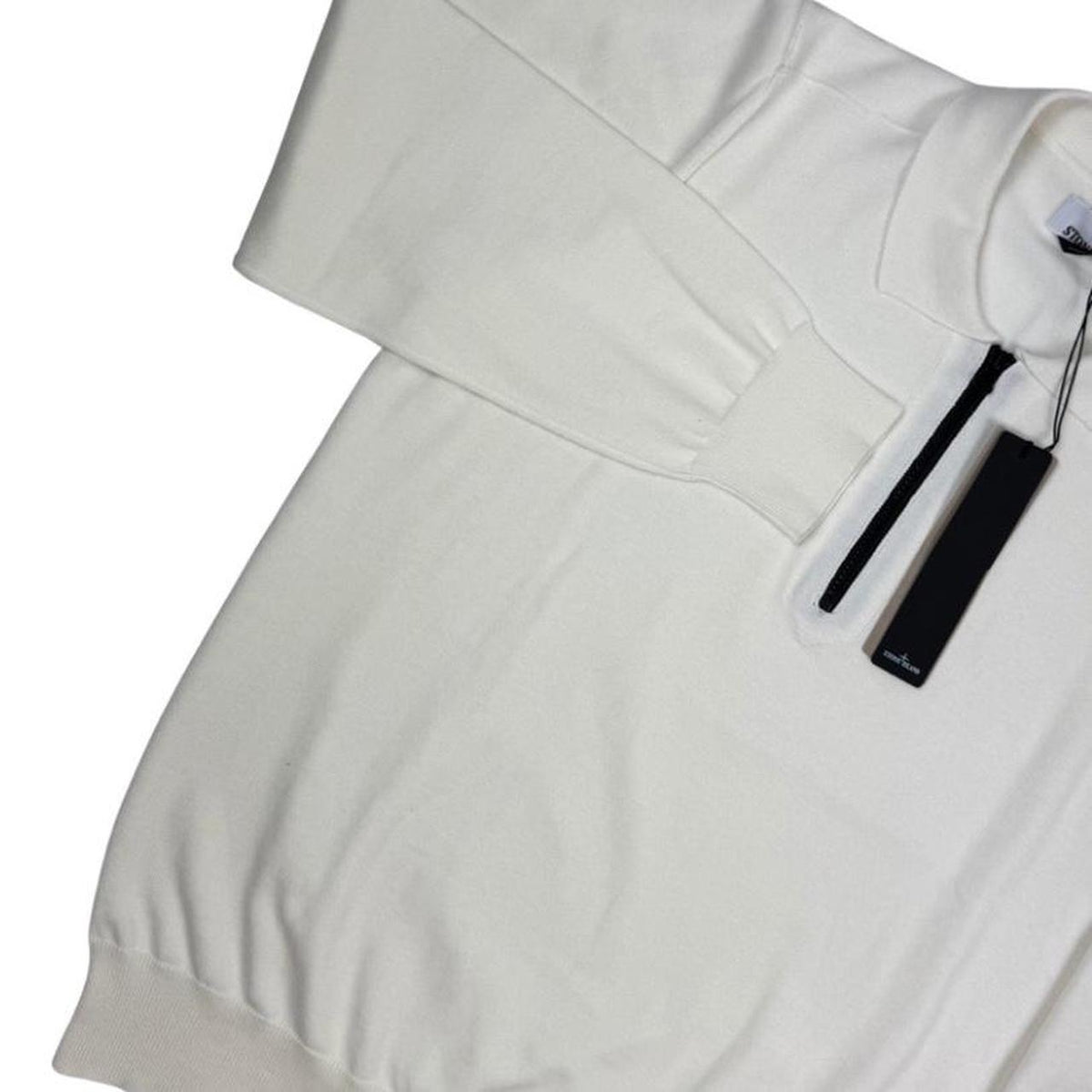 Stone Island white knit jumper with collared design and logo patch.