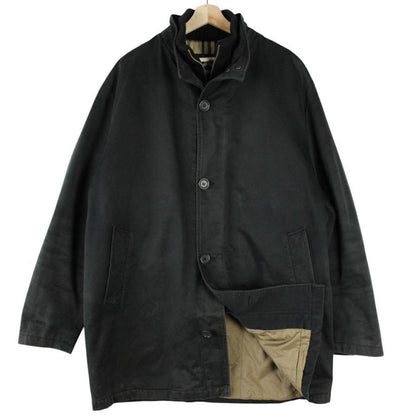 Burberry black coat with Nova Check lining and full zip closure, vintage style.