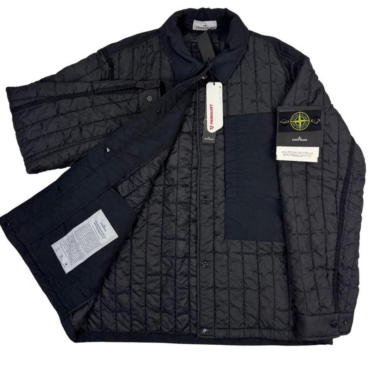 Stone Island black quilted nylon jacket with logo badge and Primaloft-TC material.