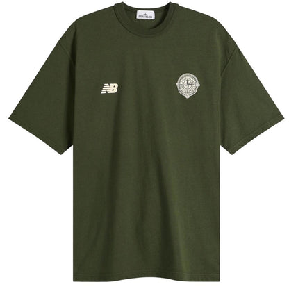 Stone Island green pocket t-shirt with embroidered crest and New Balance logo.