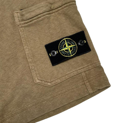 Stone Island khaki brown jogger shorts with logo patch and cotton material.