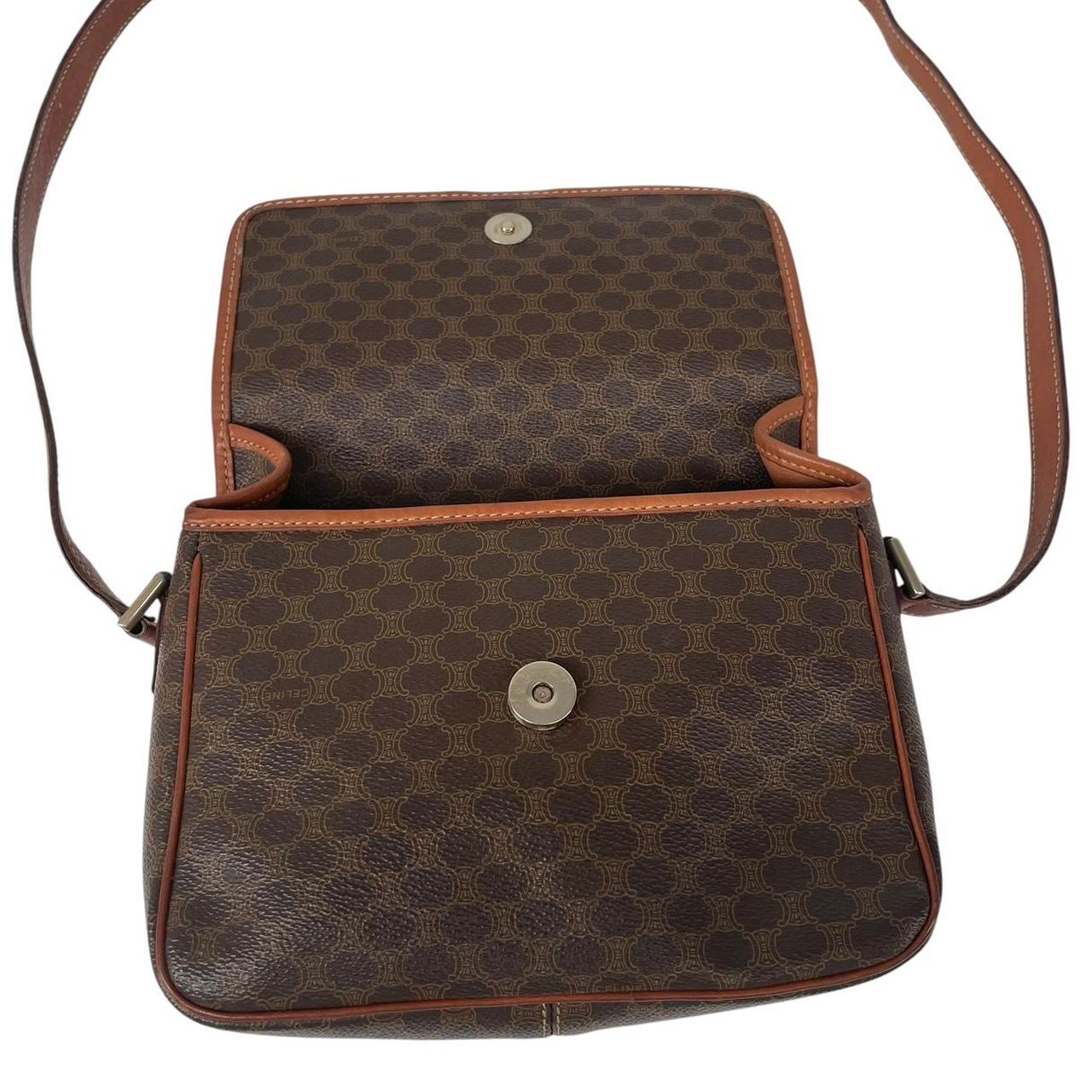 CELINE brown duffel bag with Macadam canvas pattern and logo detail.