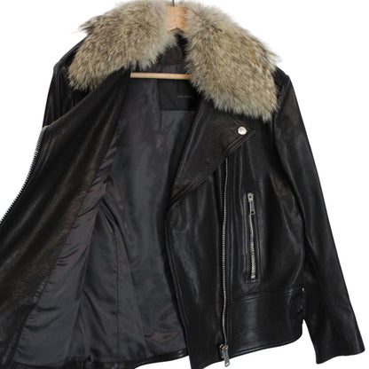 Belstaff black leather biker jacket with detachable coyote fur collar and logo detailing.