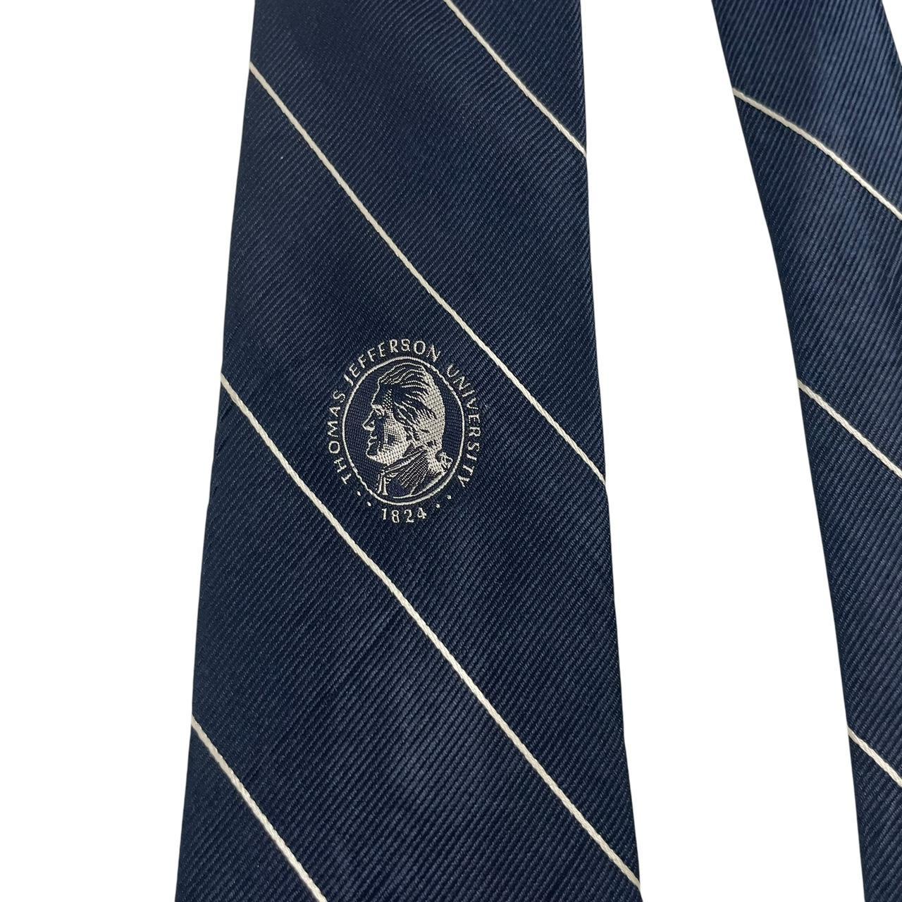 Givenchy navy blue polyester tie featuring Thomas Jefferson University logo.