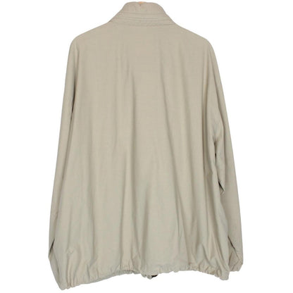 Burberry beige nylon jacket with Nova Check lining and full zip design.