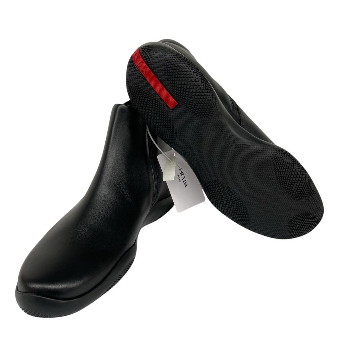 Prada black calfskin leather ankle boots with logo detail and original dust bags.