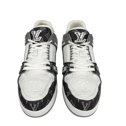 Louis Vuitton grey and white trainers with monogram pattern and leather accents.