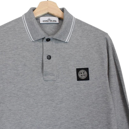 Stone Island grey long sleeve polo shirt with embroidered compass logo and slim fit.