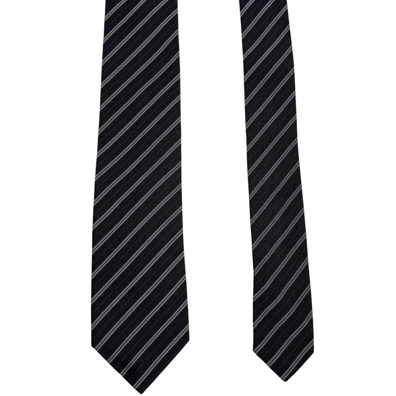 Paul Smith black and grey striped silk blend tie with subtle logo detail.