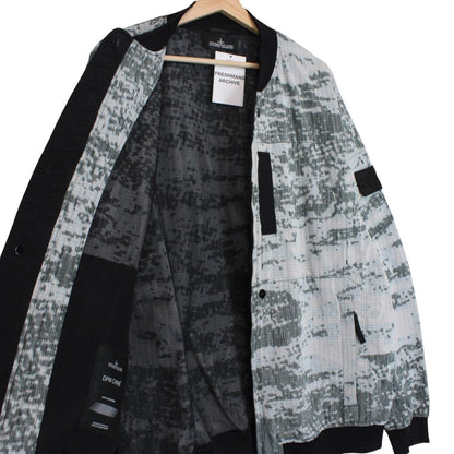 Stone Island bomber jacket grey marl with embroidered compass logo and unique pattern.
