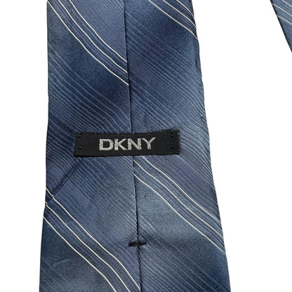 DKNY blue striped silk tie with elegant sheen and classic pattern.