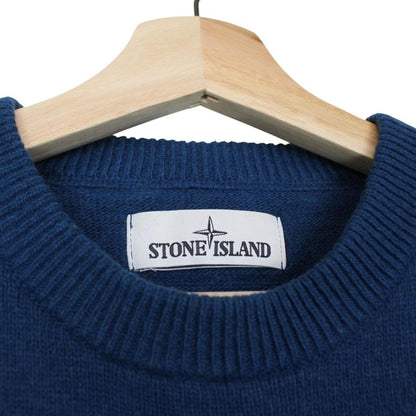 Stone Island blue wool knit jumper with logo patch and ribbed cuffs.